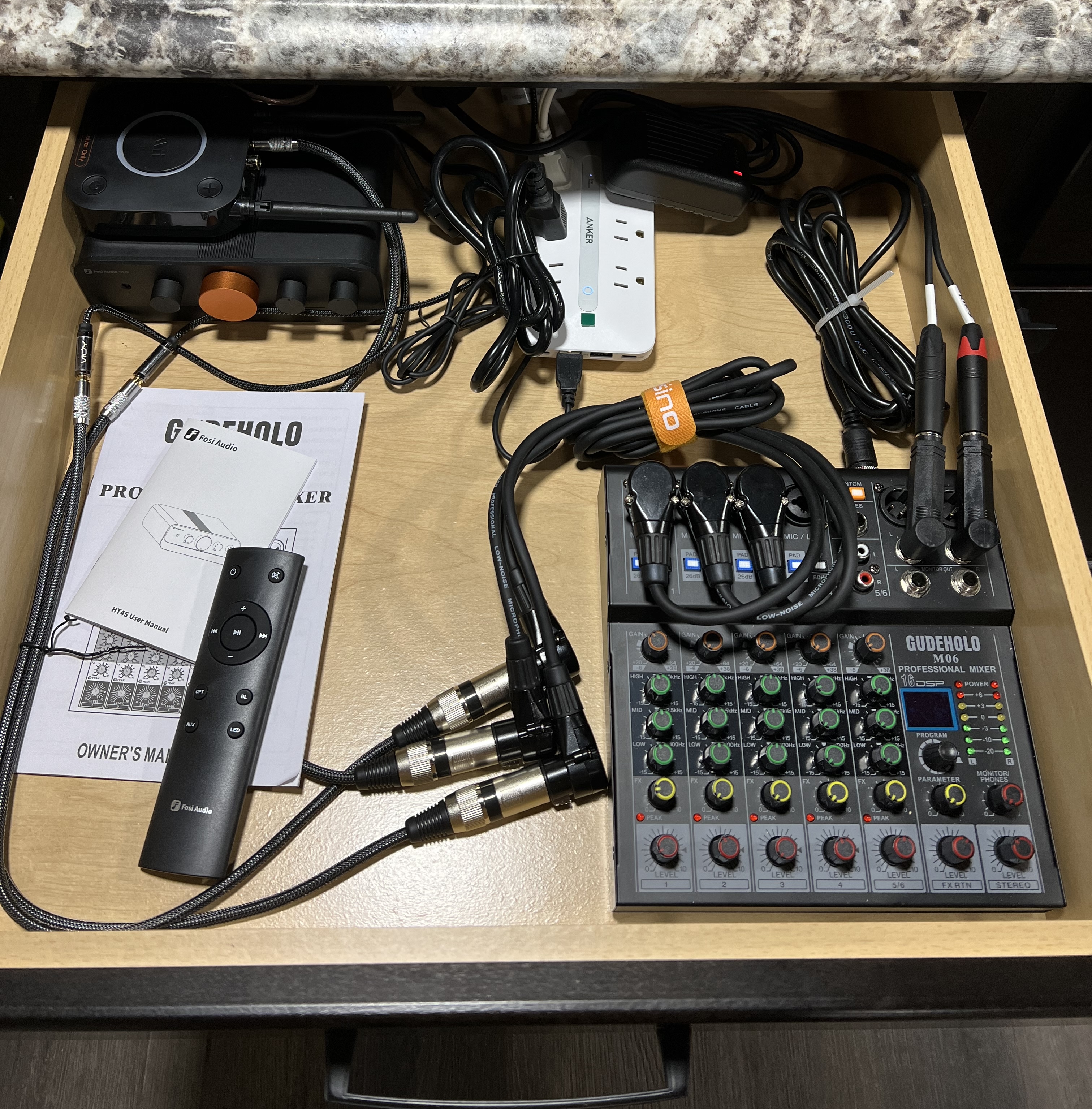 A picture of Joes cabinet which has a mixer and a Class D Amp